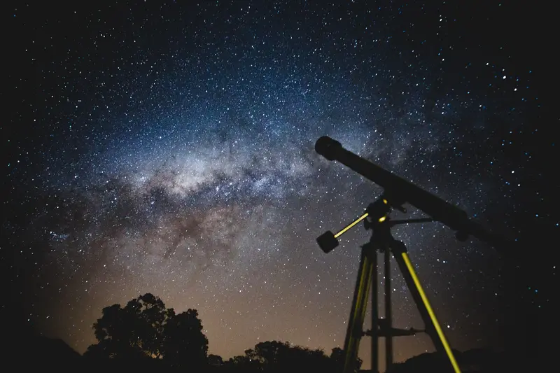 A telescope and the Milky Way at Artemis Ranch